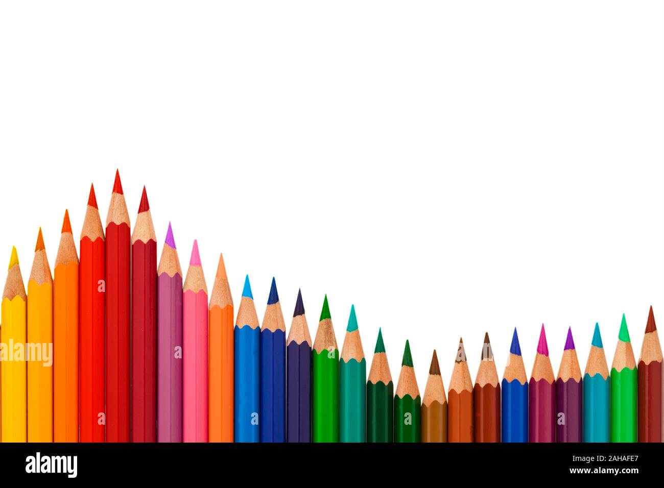 Viele verschiedene bunte Farbstifte vor weissem Hintergrund Stock Photo