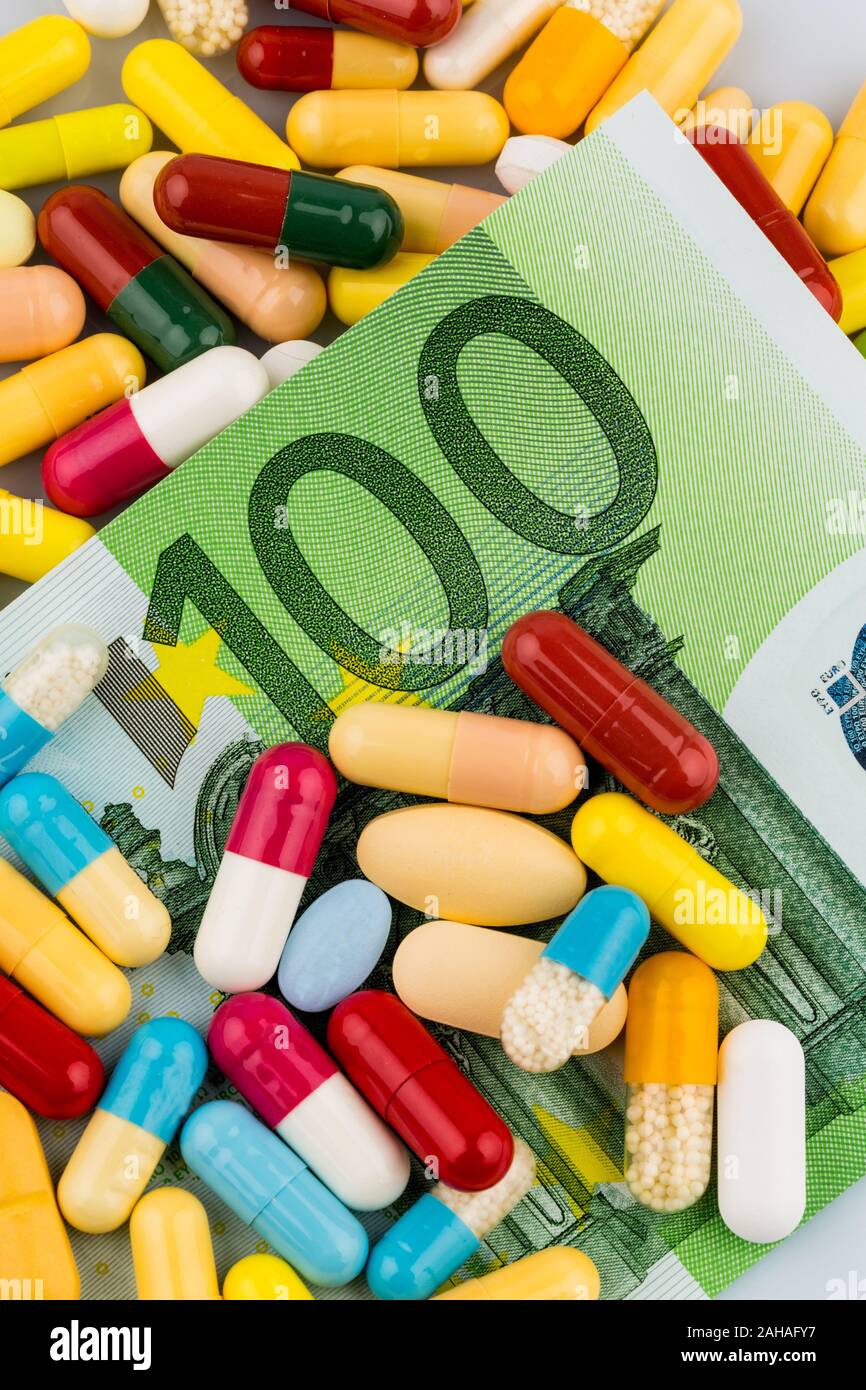 Verschiedene Tabletten, Kosten, Geld, Euro, US-Dollar,Gesundheitswesen, Krankenhasse, Medizin, Pillen, Stock Photo