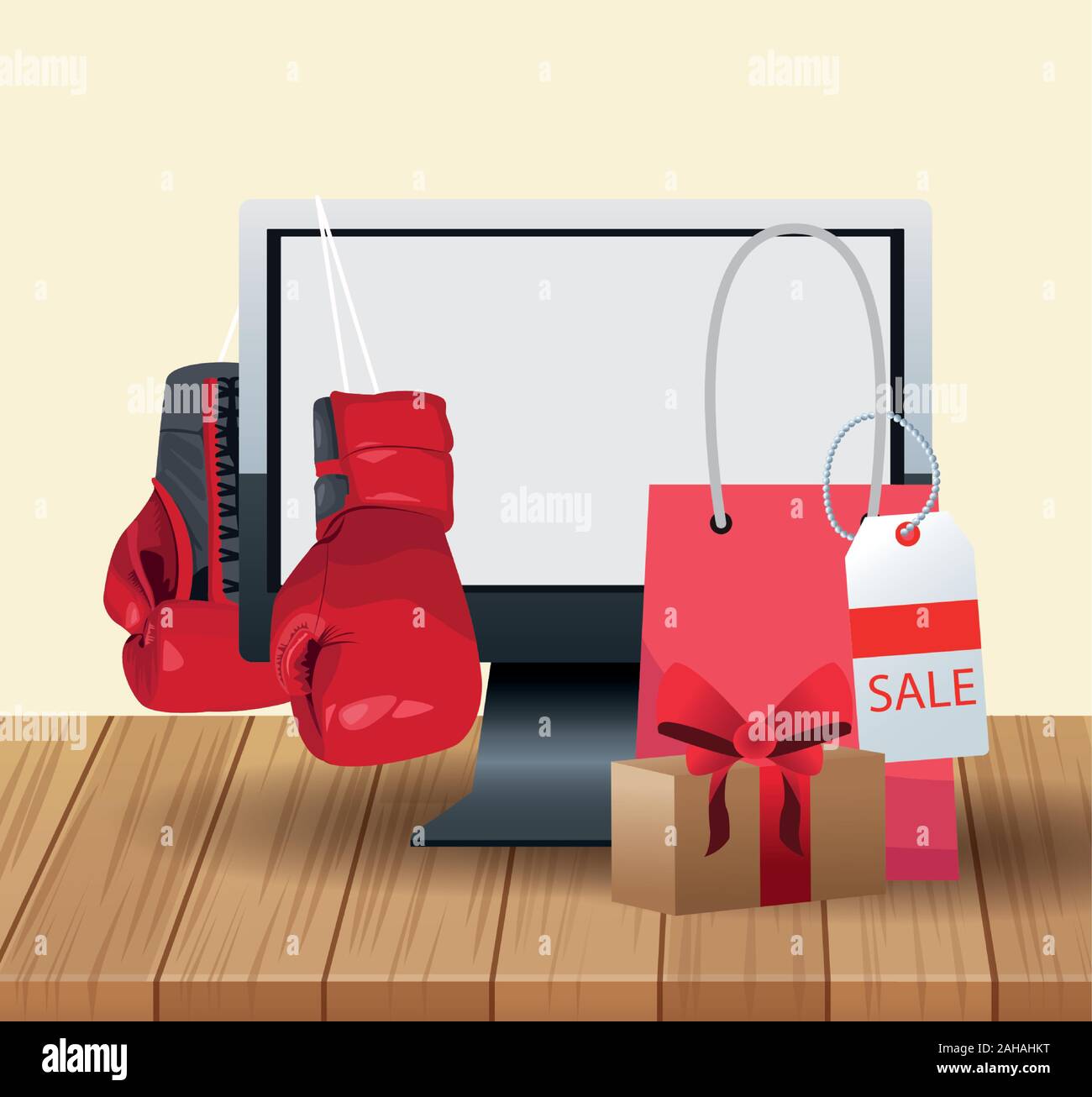 Computer and boxing gloves and shopping bag over wooden and white ...