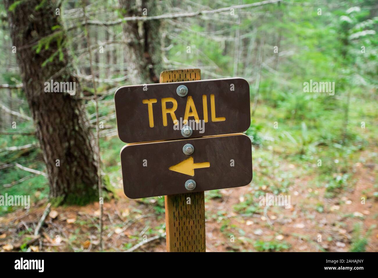 Hking Trail Sign With Direction Arrow Pointing Left Stock Photo
