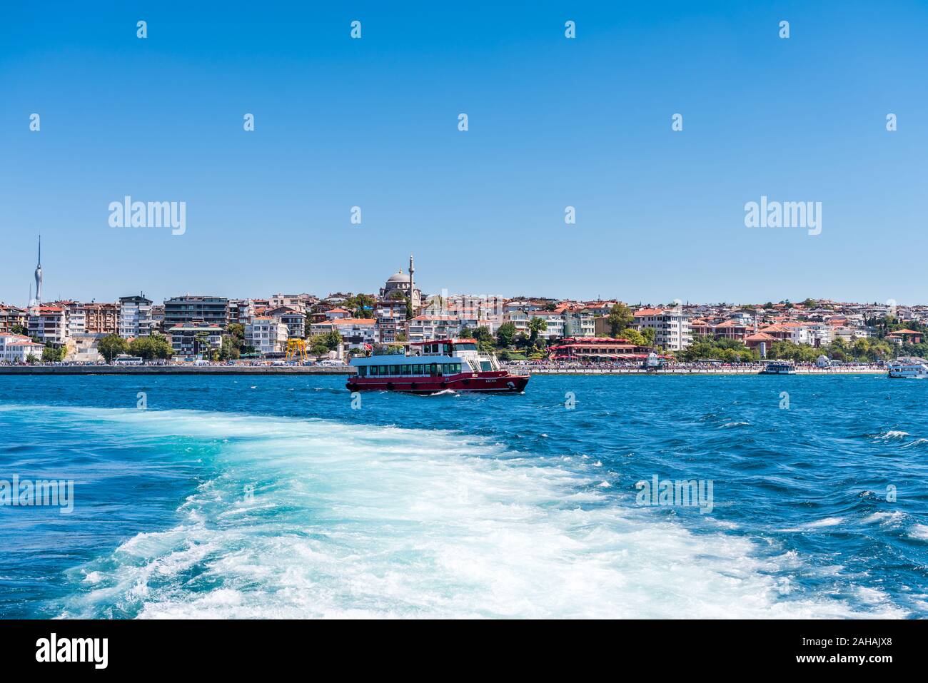 A tourists cruise ship sailing on the Bosphorus Strait of Istanbul of ...