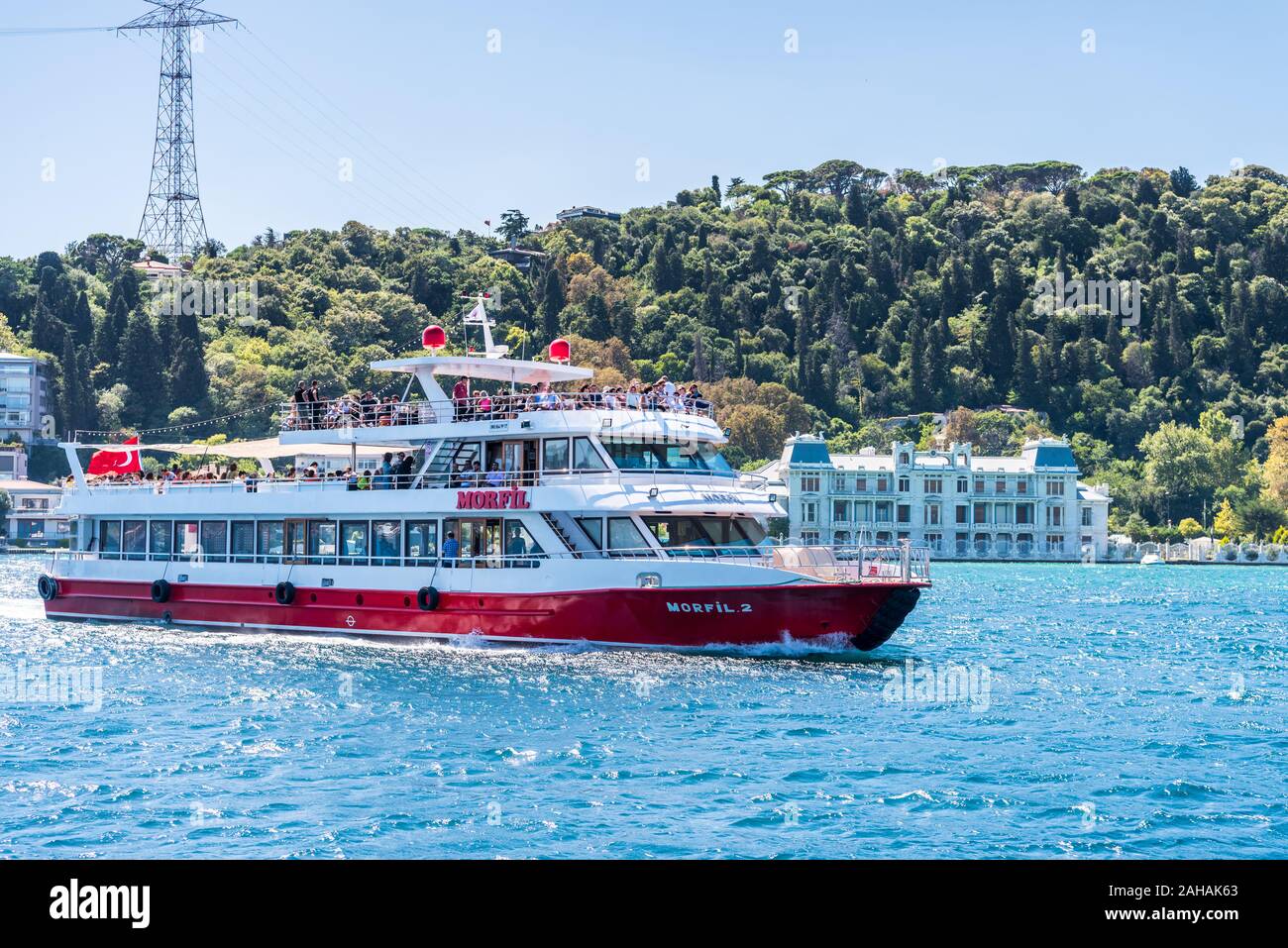 A tourists cruise ship sailing on the Bosphorus Strait of Istanbul of ...