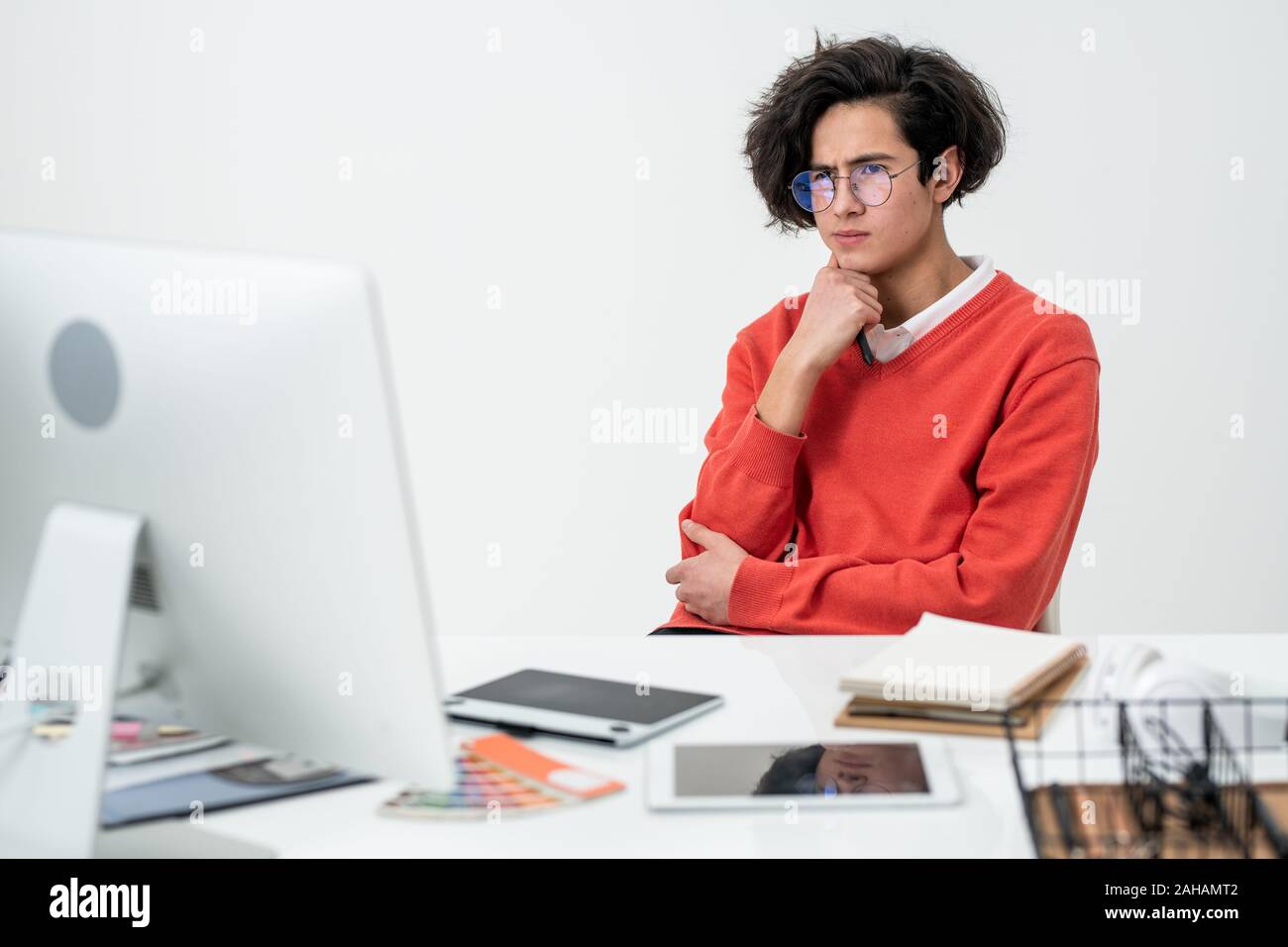 Young creative web designer concentrating on work over new online project Stock Photo