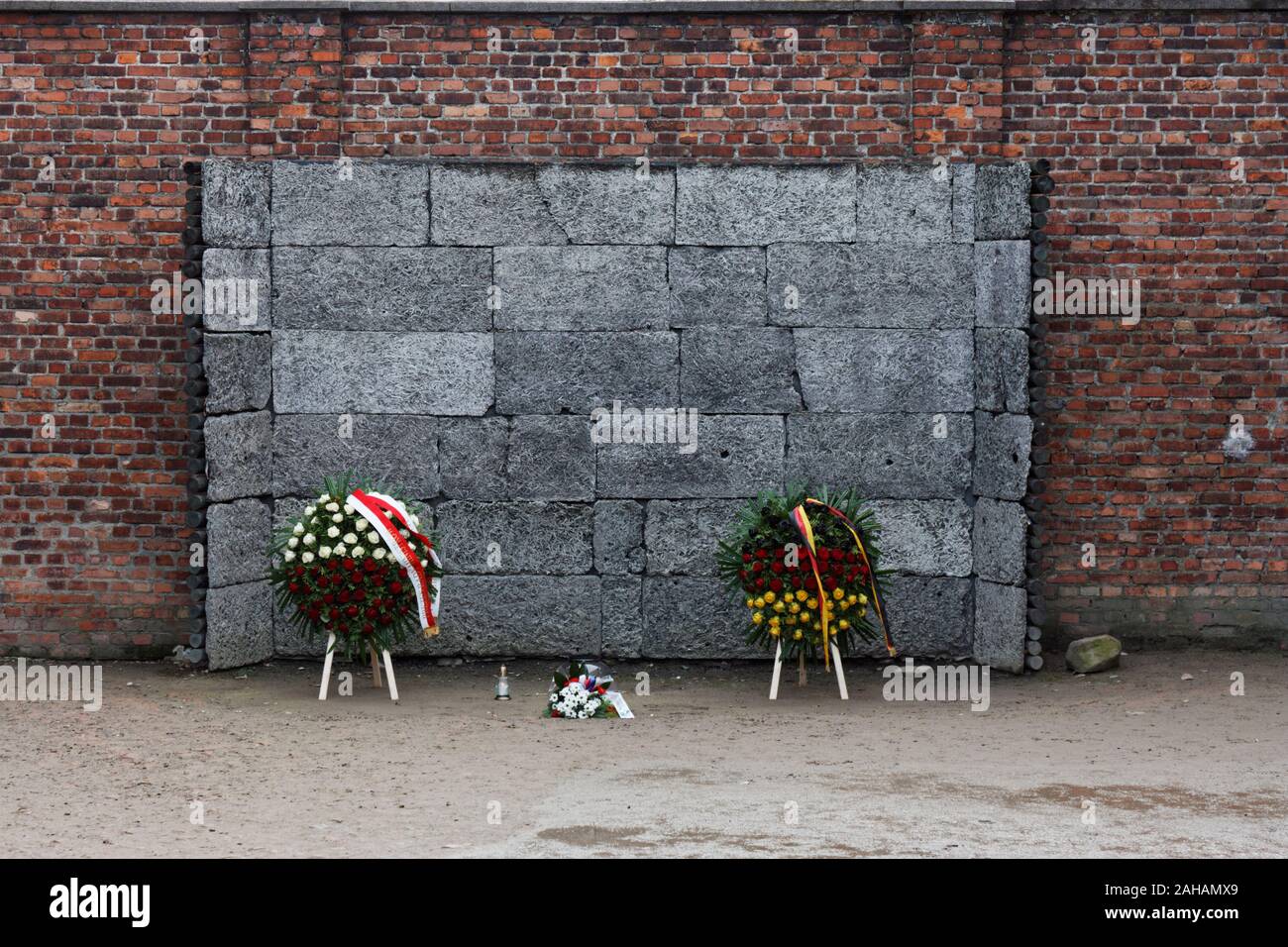The reconstructed 'death wall' where thousands of people were shot at Auschwitz concentration camp, Oświęcim, Poland Stock Photo