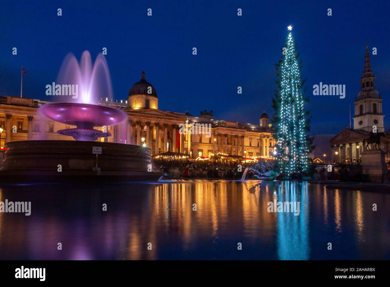 Late afternoon just before Christmas in Trafalgar Square, with the