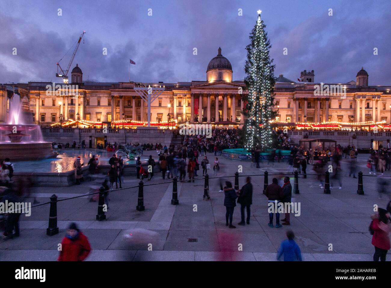 Late afternoon just before Christmas in Trafalgar Square, with the