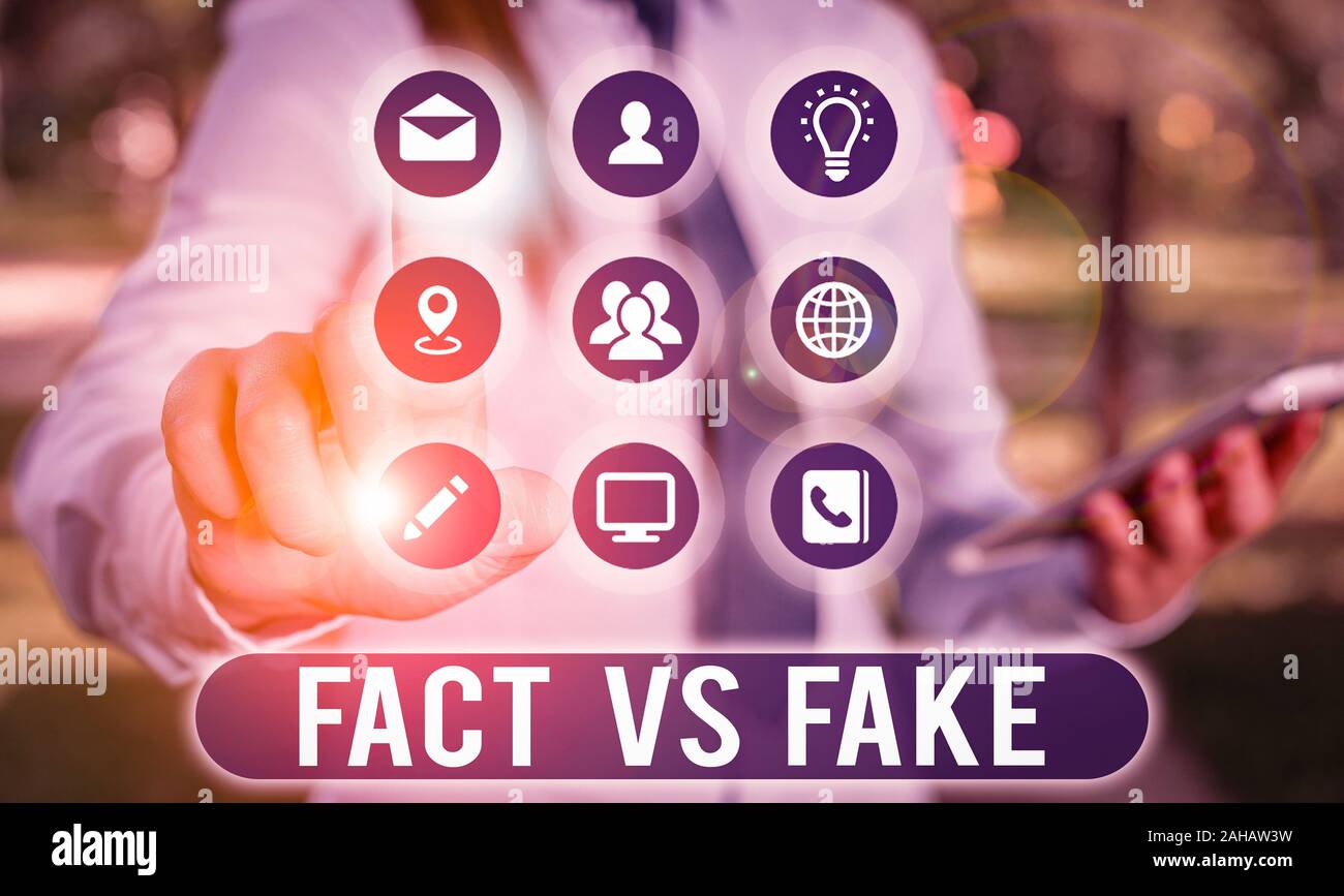 Text sign showing Fact Vs Fake. Business photo showcasing Rivalry or products or information originaly made or imitation Stock Photo