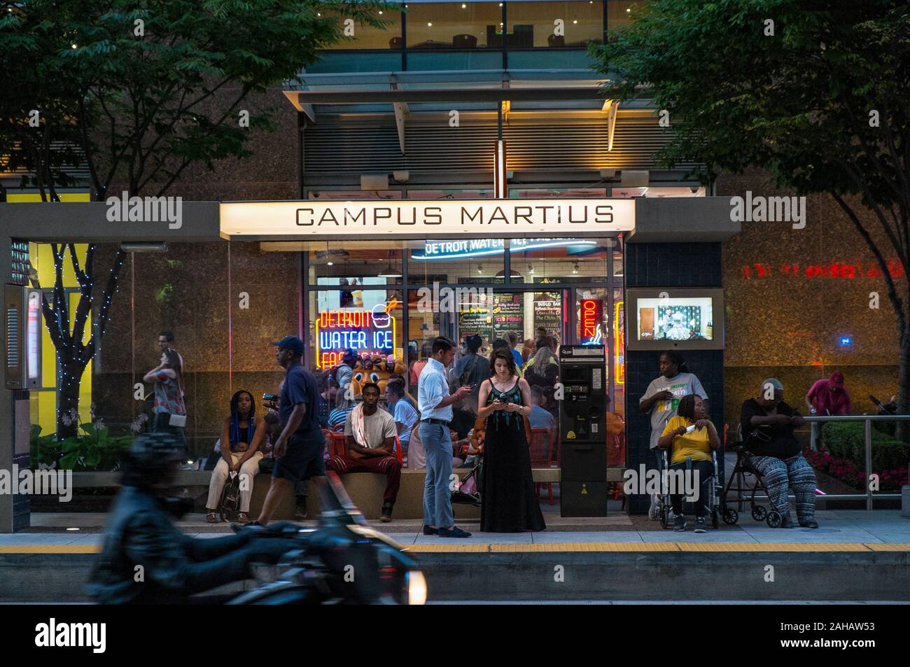 People waiting to ride the QLine street car at the Campus Martius station, Detroit, Michigan, USA Stock Photo