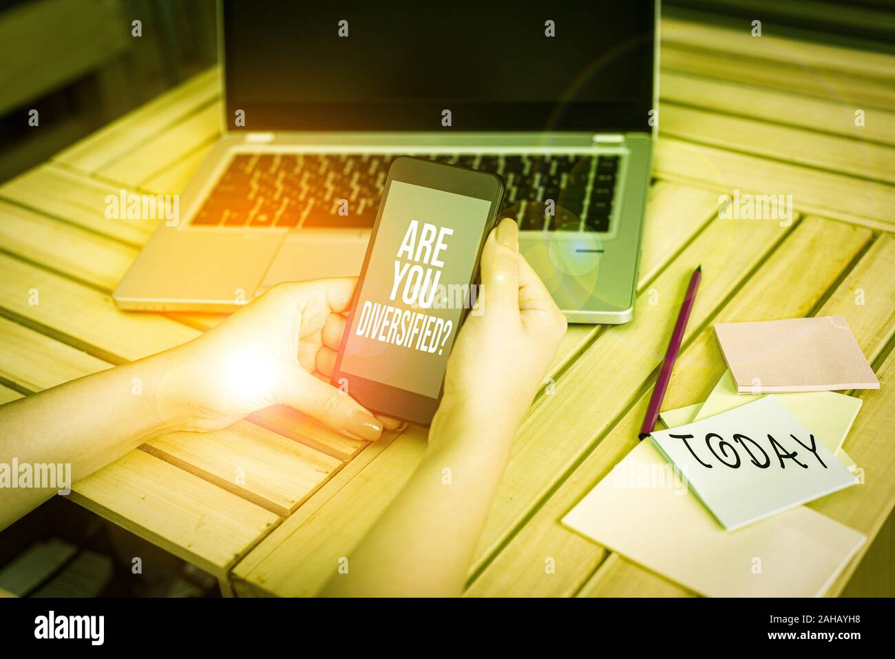 Text sign showing Are You Diversified Question. Business photo showcasing someone who is Different Mixed Multi Faceted woman laptop computer smartphon Stock Photo