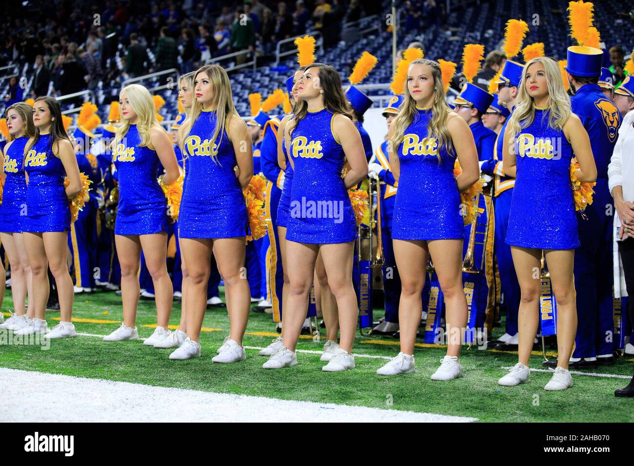 Detroit, Michigan, USA. 26th Dec, 2019. Pittsburgh Panthers cheerleaders stand for the National Anthem at the NCAA Quick Lane Bowl game between the Eastern Michigan Eagles and the Pittsburgh Panthers at Ford Field in Detroit, Michigan. JP Waldron/Cal Sport Media/Alamy Live News Stock Photo