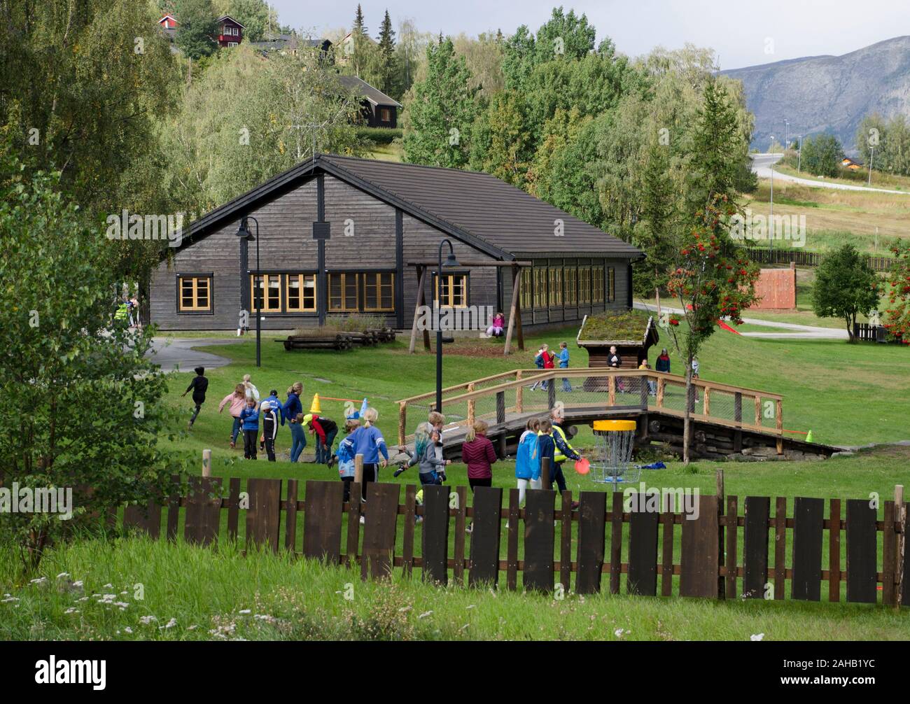 A schoolhouse and schoolyard in Lom, Norway Stock Photo