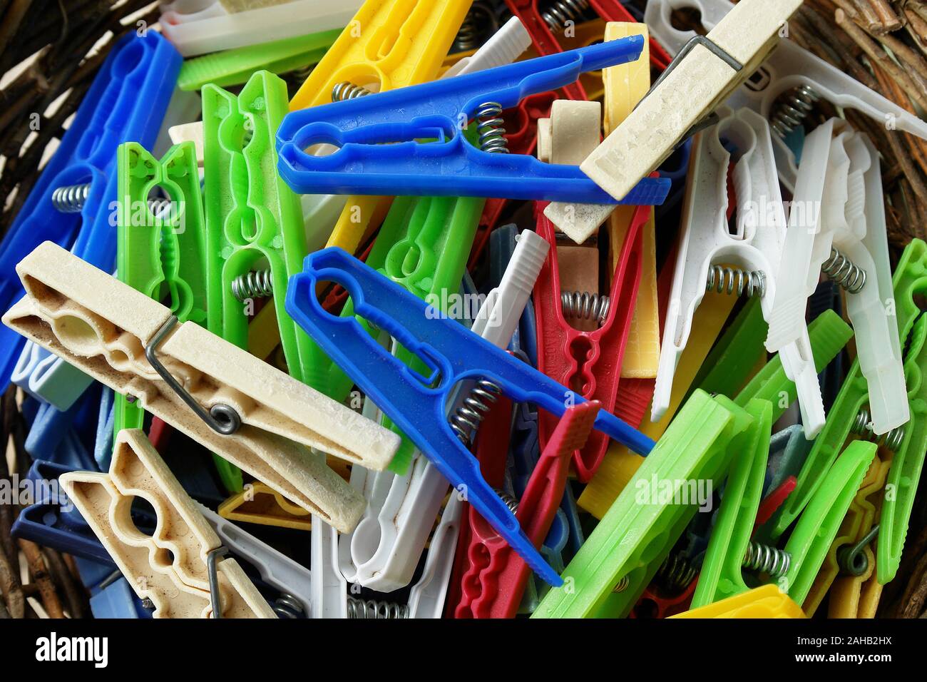 Laundry coloured pin basket to hang the laundry Stock Photo Alamy