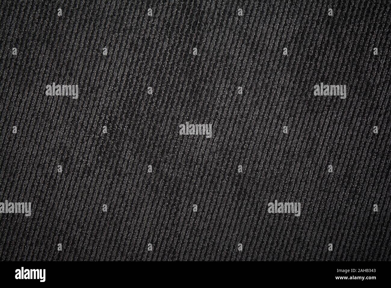 Here is a dark gray fabric texture with lines working in a diagonal ...