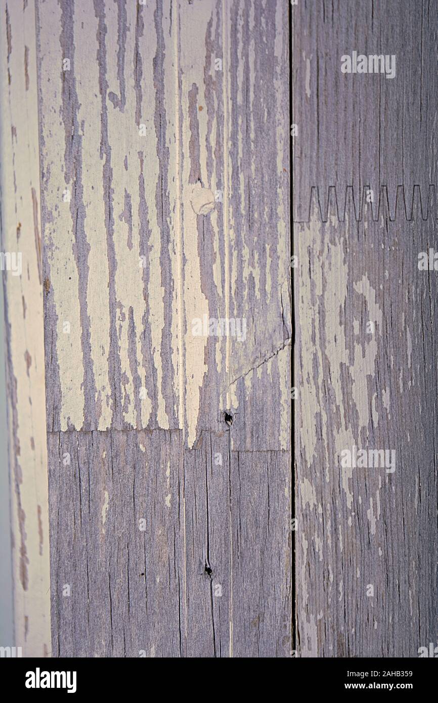 Rustic old weathered wooden white door trim on a house Stock Photo
