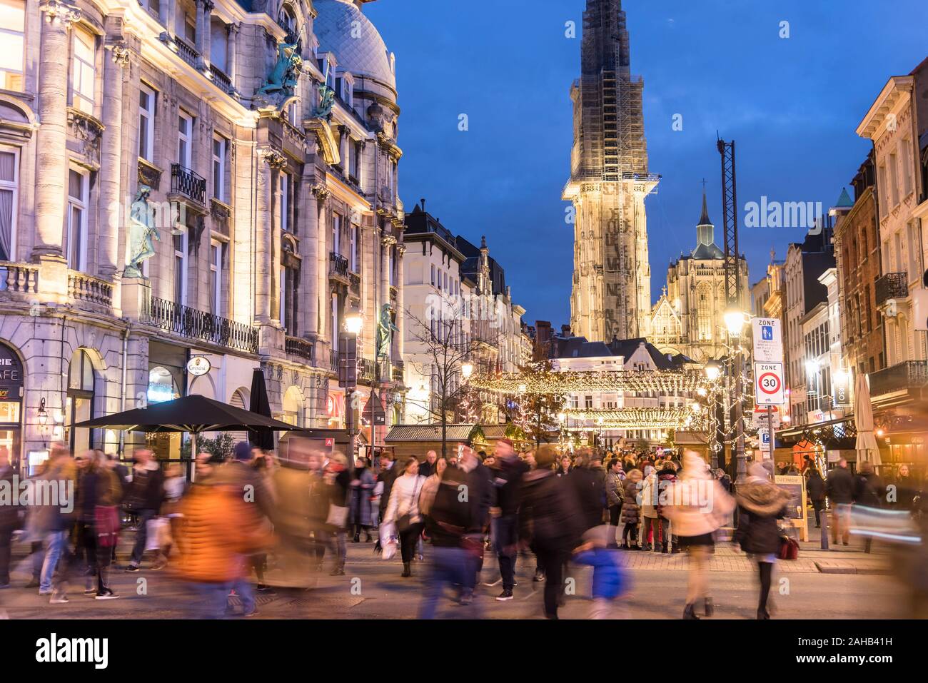 Antwerp, Belgium - December 7, 2019: people strolling around the Christmas market in Suikerui street Stock Photo