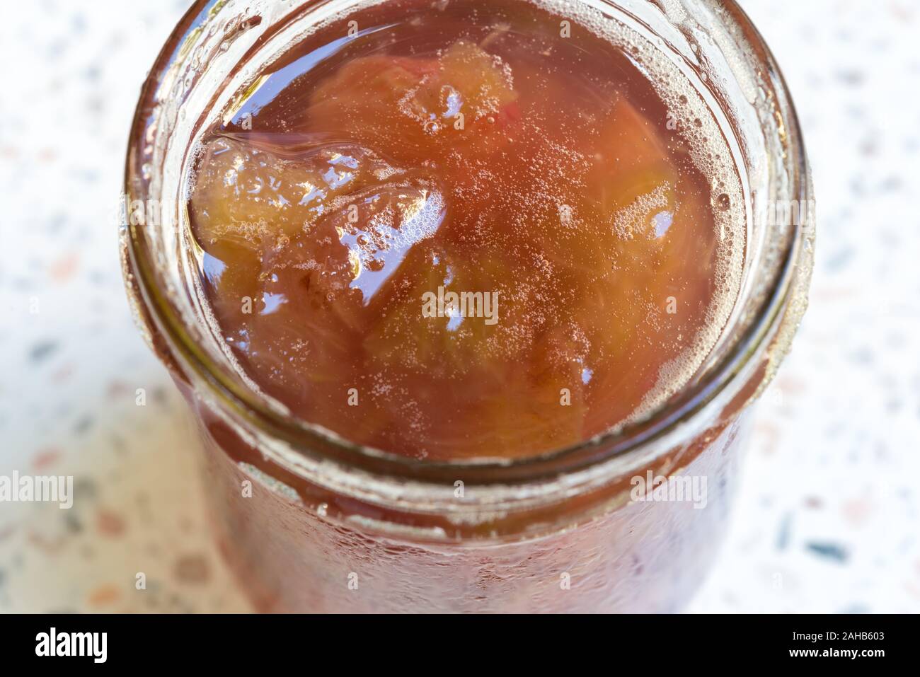 Java apple (Syzygium samarangense) homemade jam in a glass jar. The fruit is also known as Semarang rose-apple (rose apple) and wax jambu Stock Photo