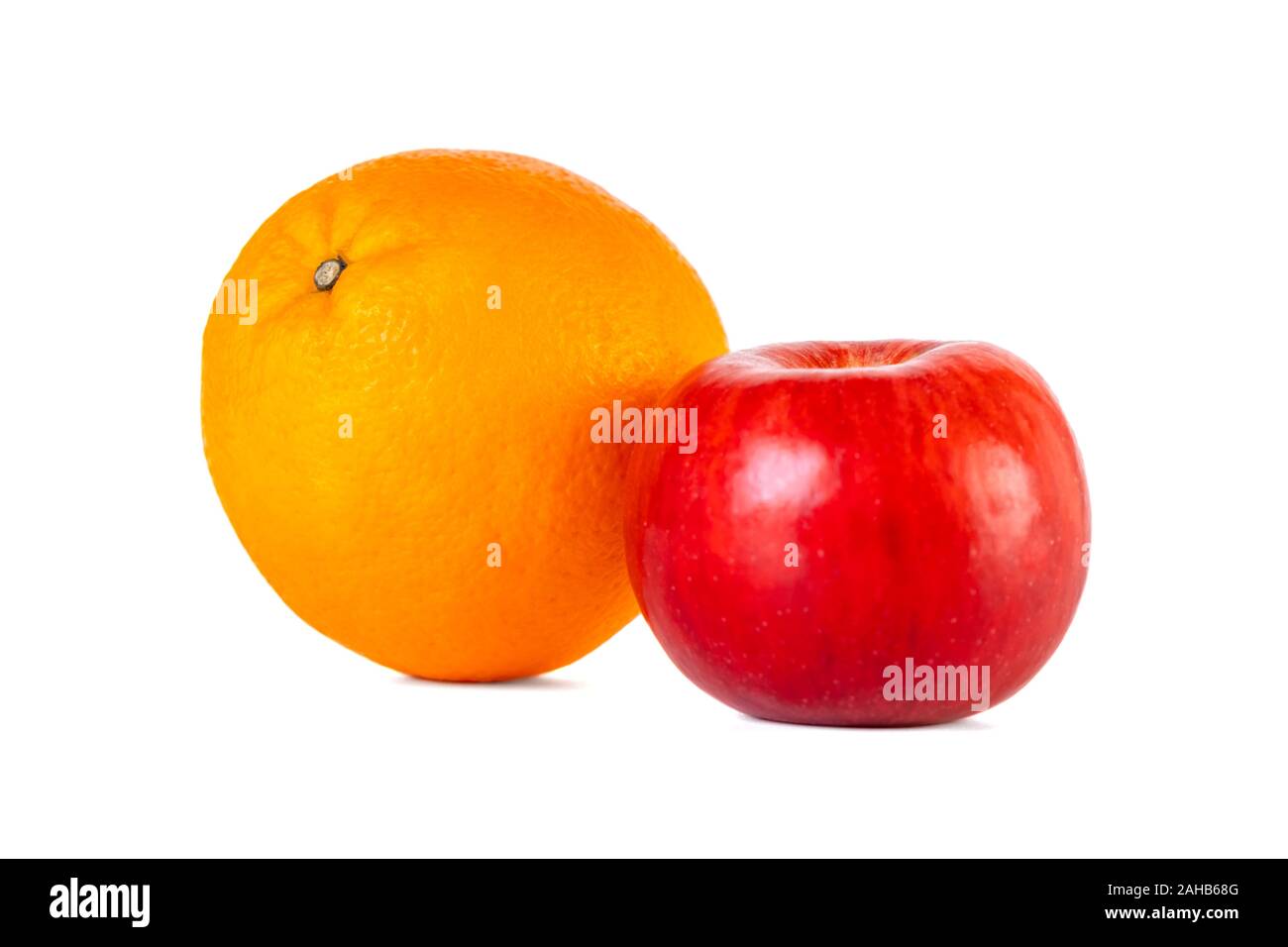 Single orange fruit and red apple isolated on white background Stock ...