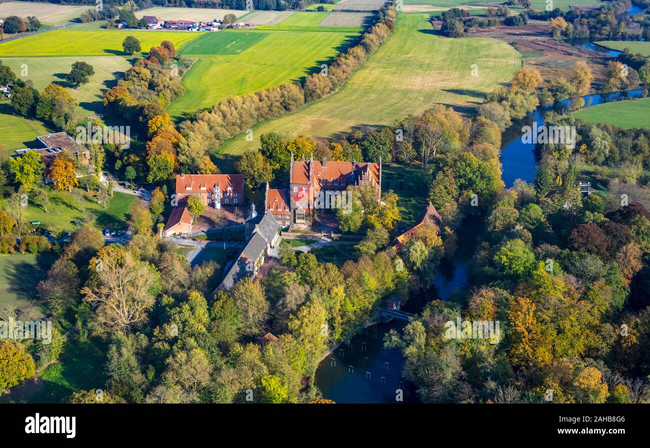 Aerial view, Schloss Oberwerries on the river Lippe, Lippeaue, flying geese above the castle, morning impression, Golden October, Hamm, Ruhr area, Nor Stock Photo