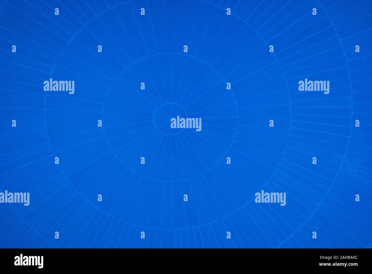 Blue background with spherical circular patterns. Stock Photo