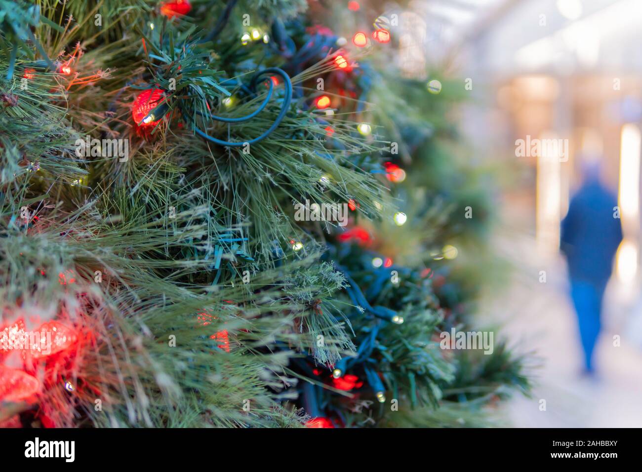 Christmas tree on display in shopping mall during boxing day and year