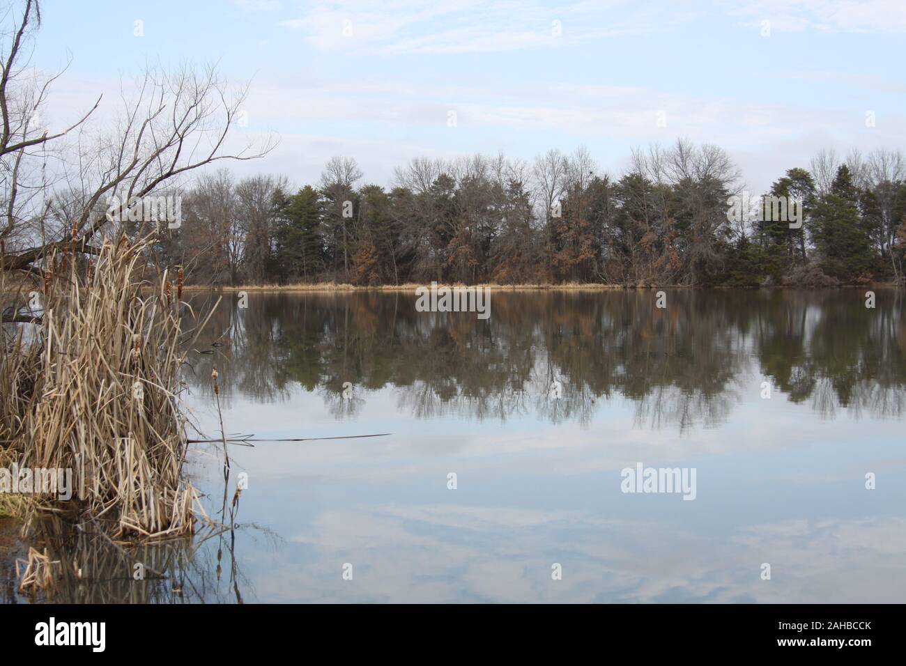 Blue Sky and White clouds, reflecting water Stock Photo - Alamy