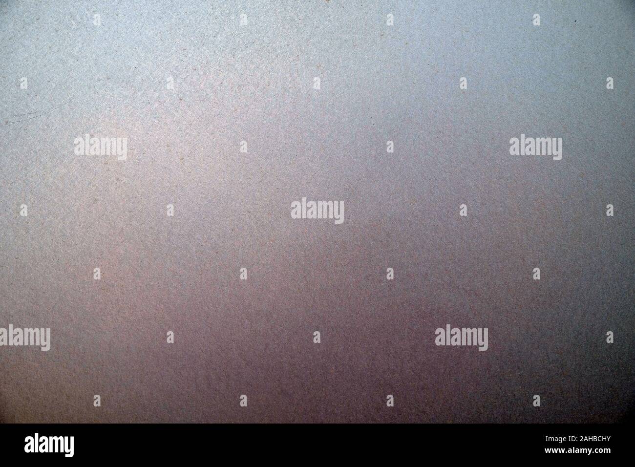 Polished metal surface, dark surface finish with wire brush, large empty space for text. Stock Photo