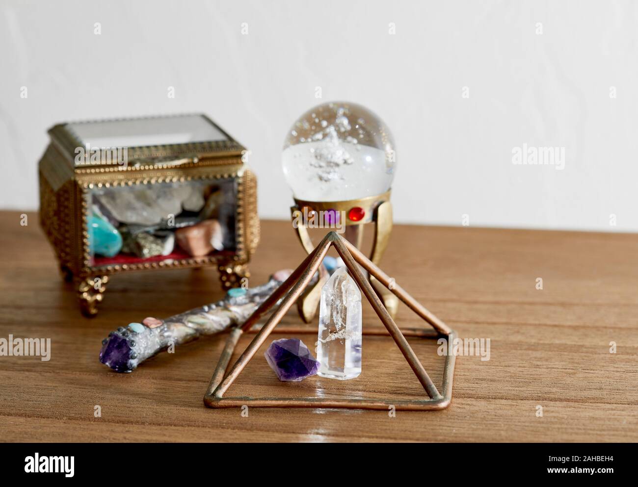 Pyramids Onpoint Crystal Quartz Crystal Point with amethyst point under a copper pyramid with a ...