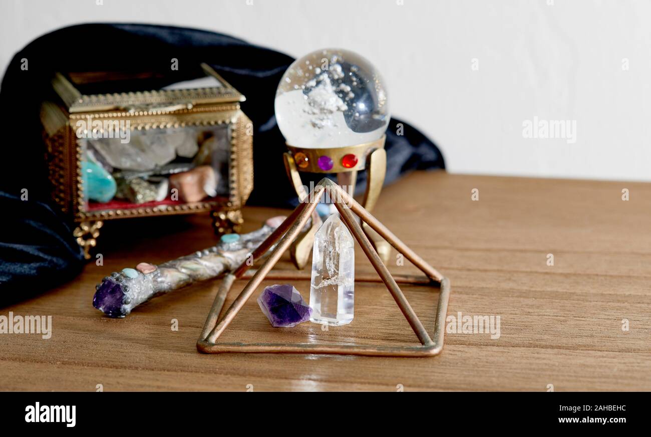 Pyramids Onpoint Crystal Quartz Crystal Point with amethyst point under a copper pyramid with a ...