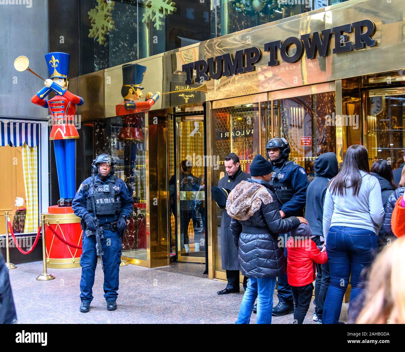 New York, USA,  27 December 2019.  Heavily armed policemen keep guard at the entrance of Trump Tower in midtown New York City.  Security has been tigh Stock Photo
