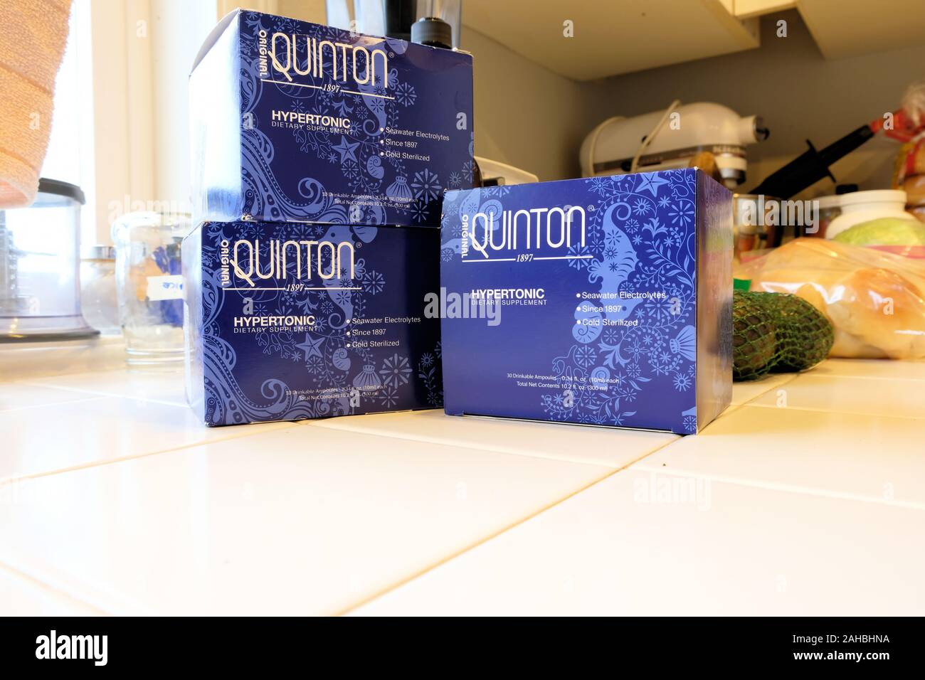Three boxes of Quinton Hypertonic concentrated supplement: pure seawater  electrolyte liquid minerals for athletic performance energy support Stock  Photo - Alamy