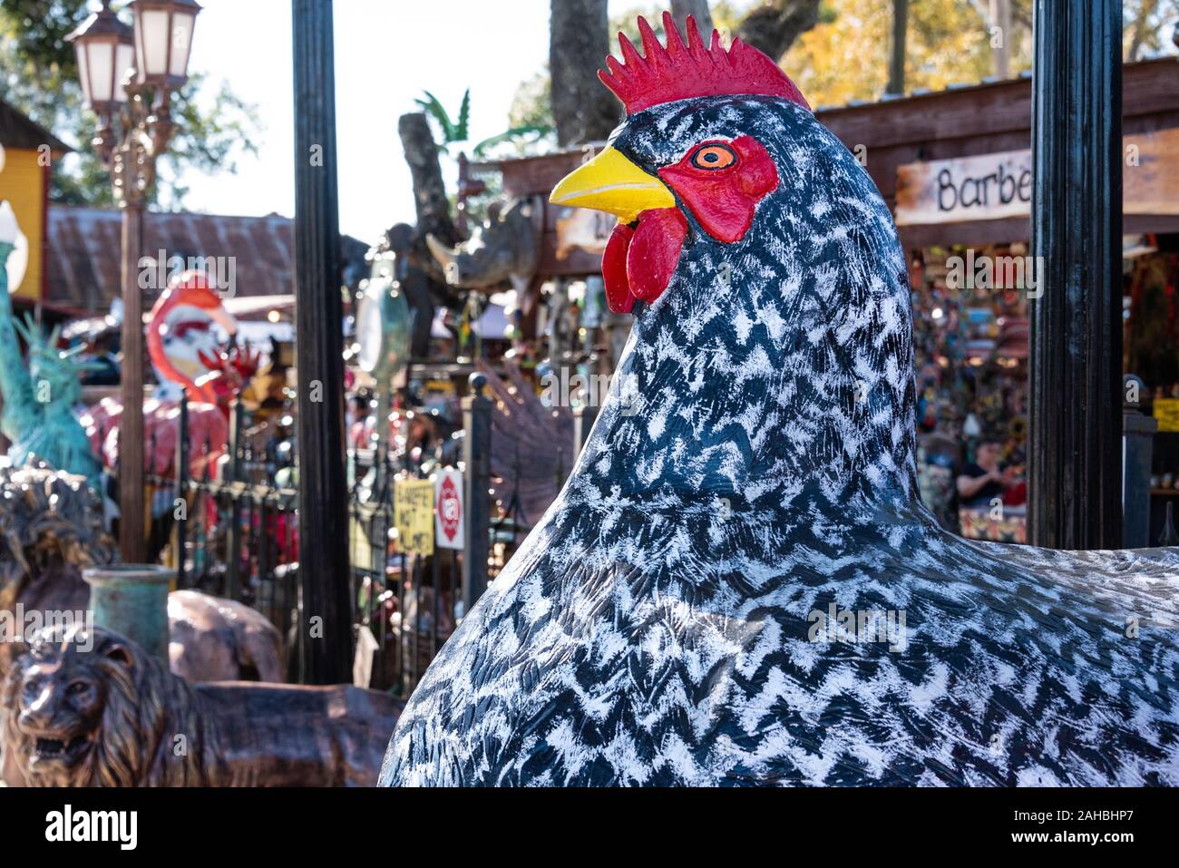 Giant painted chicken made of recycled cast aluminum at Barberville Roadside Yard Art Emporium in Pierson, Florida. (USA) Stock Photo