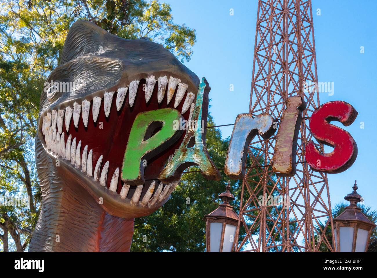 Dinosaur about to devour Paris at Barberville Roadside Yard Art Emporium in Pierson, Florida. (USA) Stock Photo
