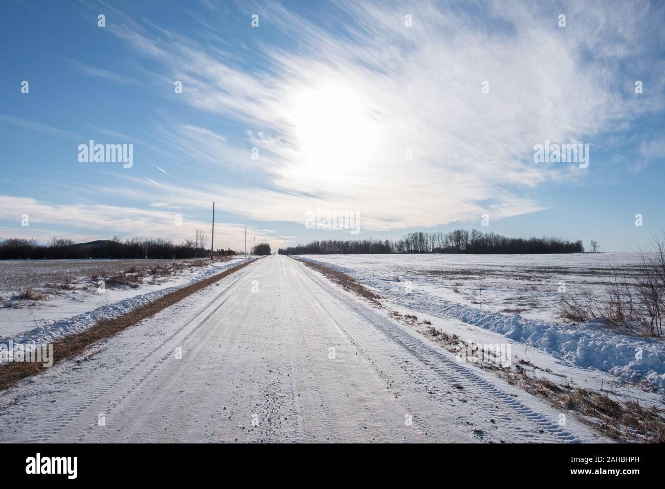 Country Road in Winter, Big Sky Stock Photo