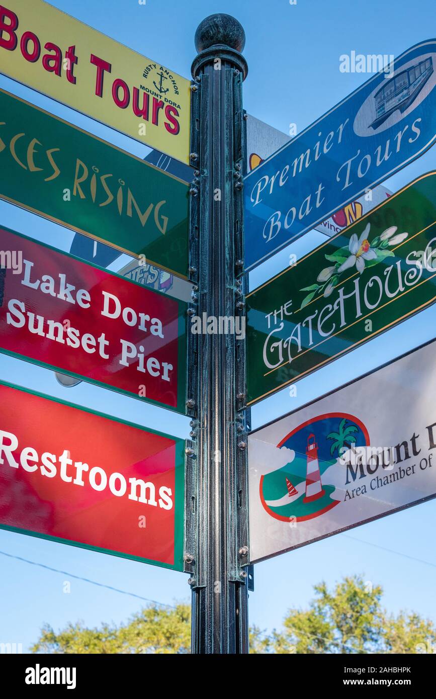 Street corner directional sign in downtown Mount Dora, a popular tourist and festival location in Central Florida. (USA) Stock Photo