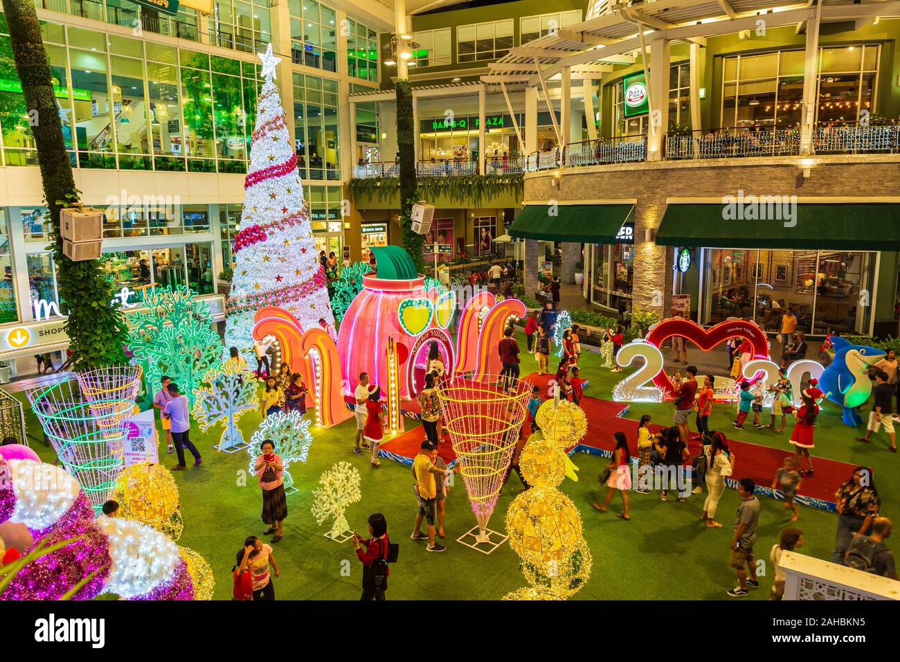 HuaHin, Thailand - December 21, 2019: Christmas and happy new year celebration decorative light in front of HuaHin Market Village shopping mall in Hua Stock Photo