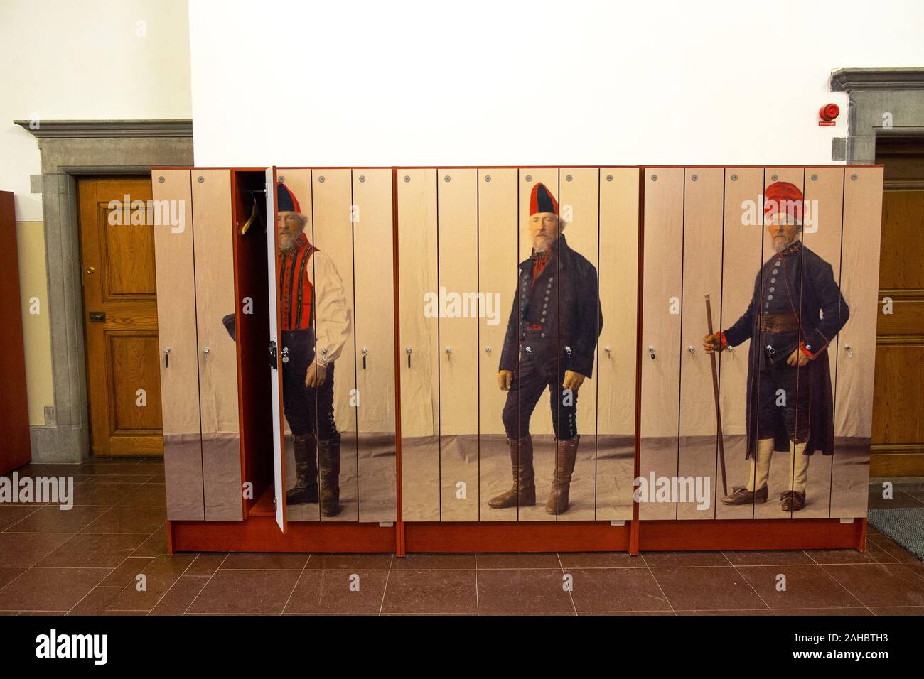 Paintings of traditional Swedish folk dress on lockers at the Nordiskamuseet, Stockholm, Sweden Stock Photo