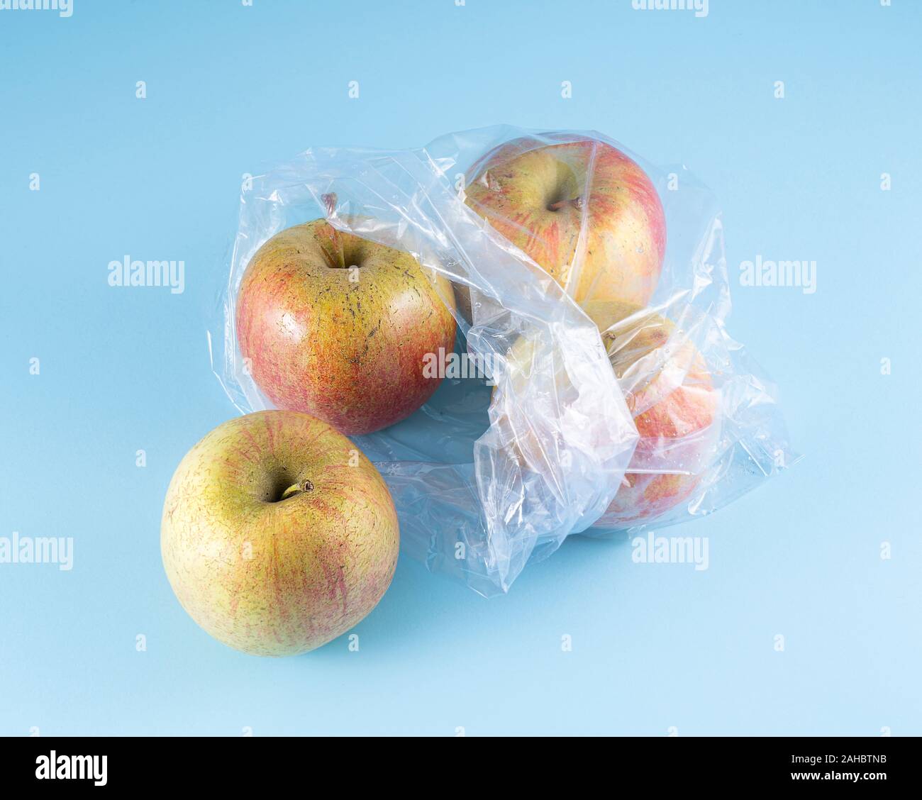 some apples in a plastic bag Stock Photo Alamy