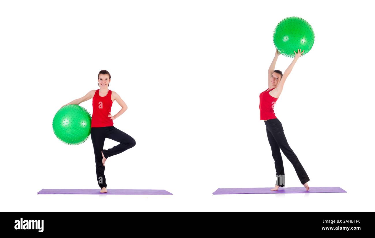 The young woman exercising with swiss ball Stock Photo - Alamy