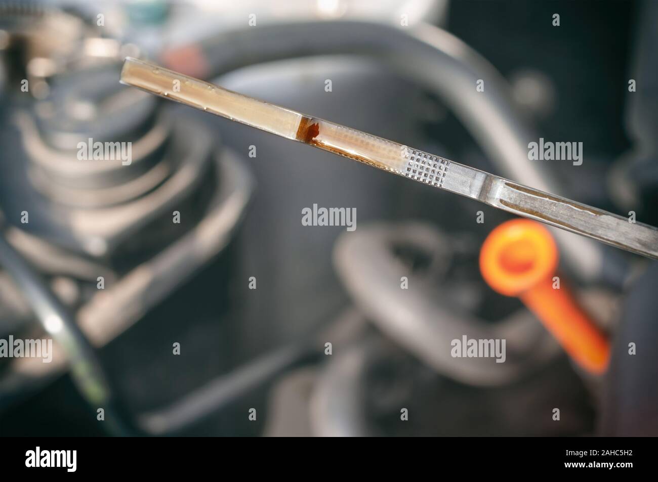 Car oil level check with dipstick Stock Photo Alamy