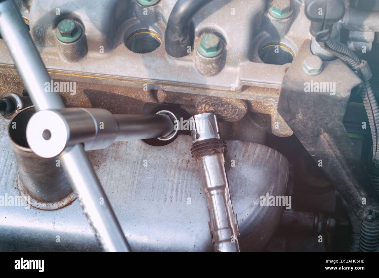 Car engine spark plug replacement Stock Photo Alamy