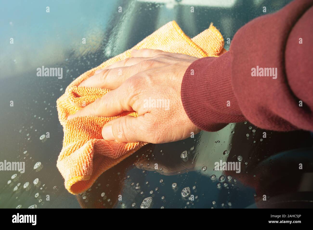 Car windshield wash with microfiber cloth Stock Photo Alamy