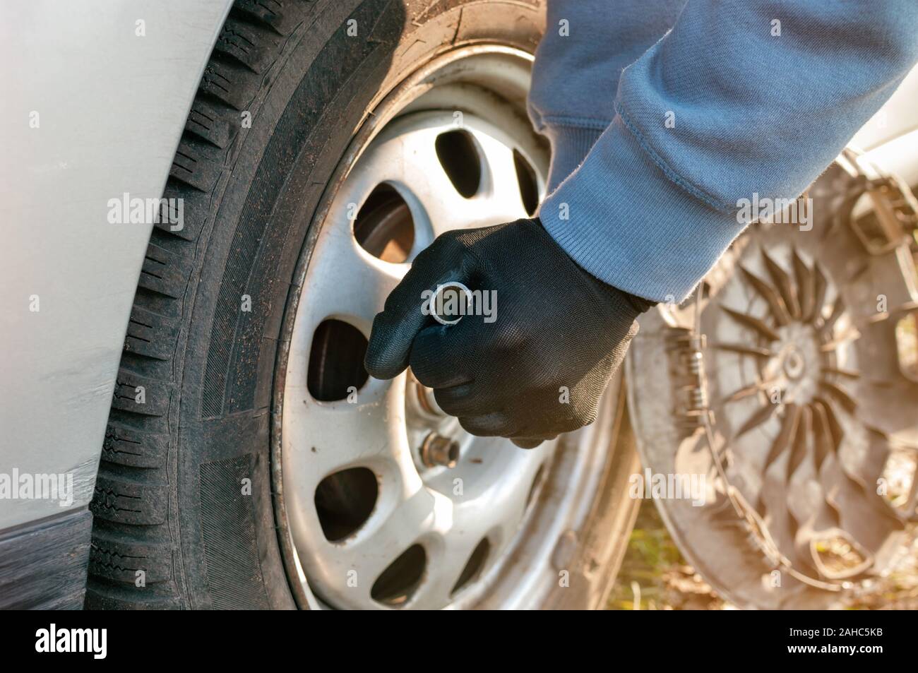 Car wheel change outside Stock Photo Alamy