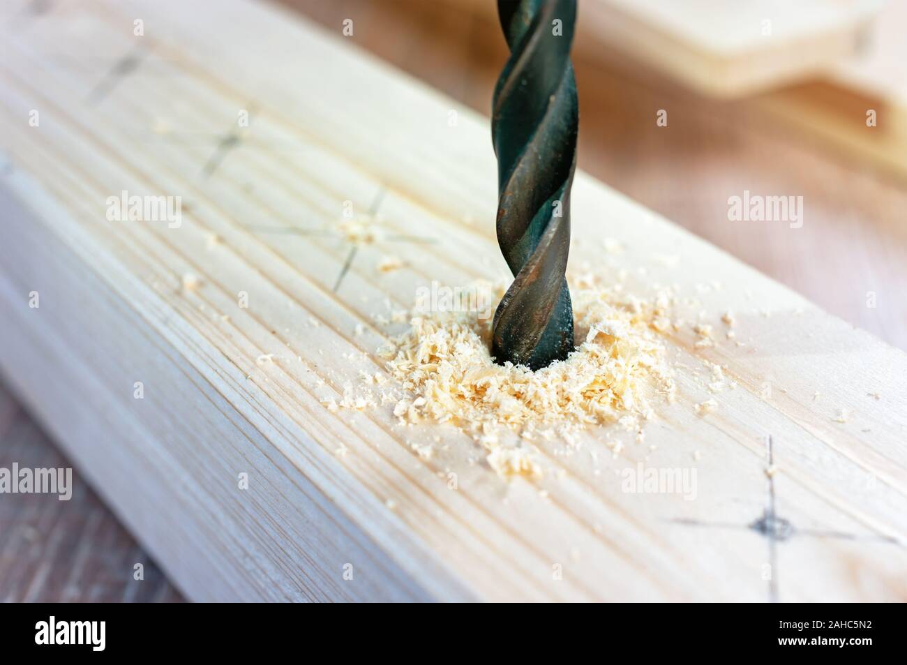 Making hole into the wood with drill bit Stock Photo Alamy