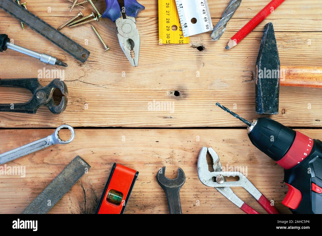 Set of hand tools on wooden background Stock Photo