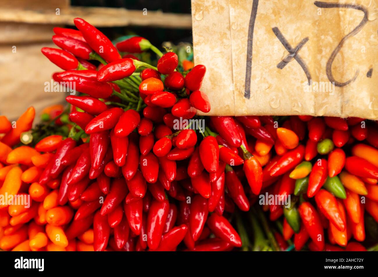 red peppers for sale at the market Stock Photo - Alamy