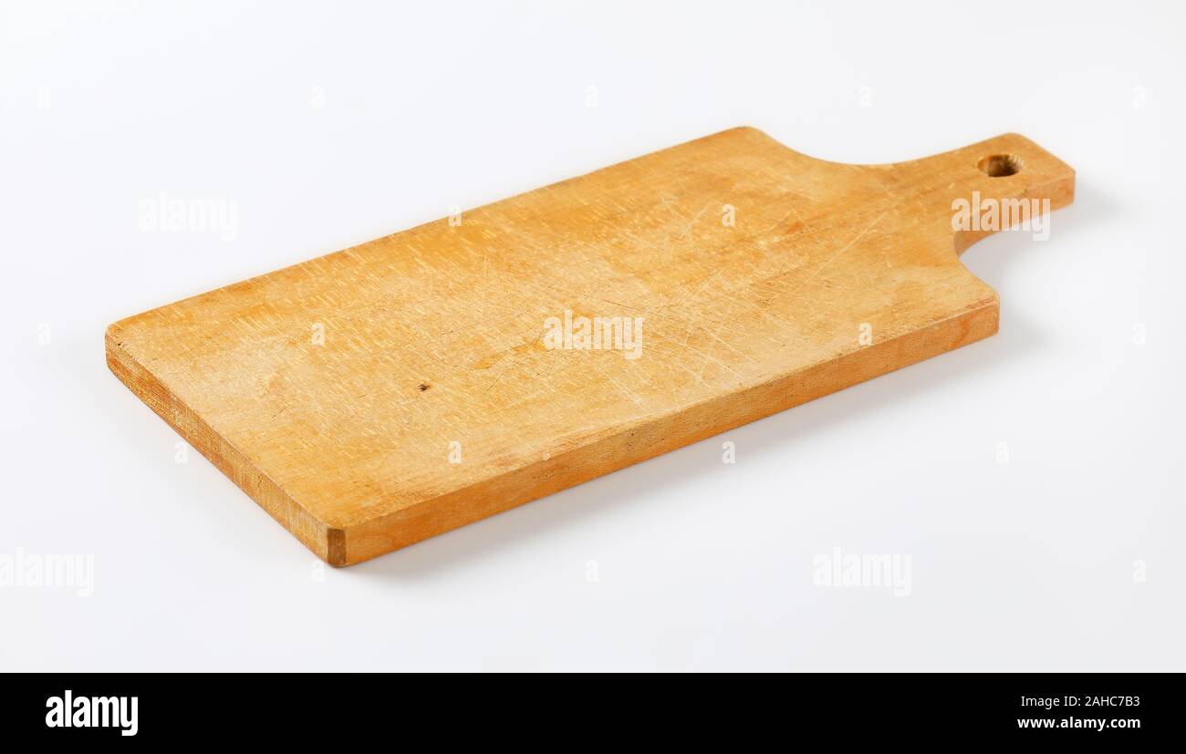 Wooden cutting board with handle Stock Photo