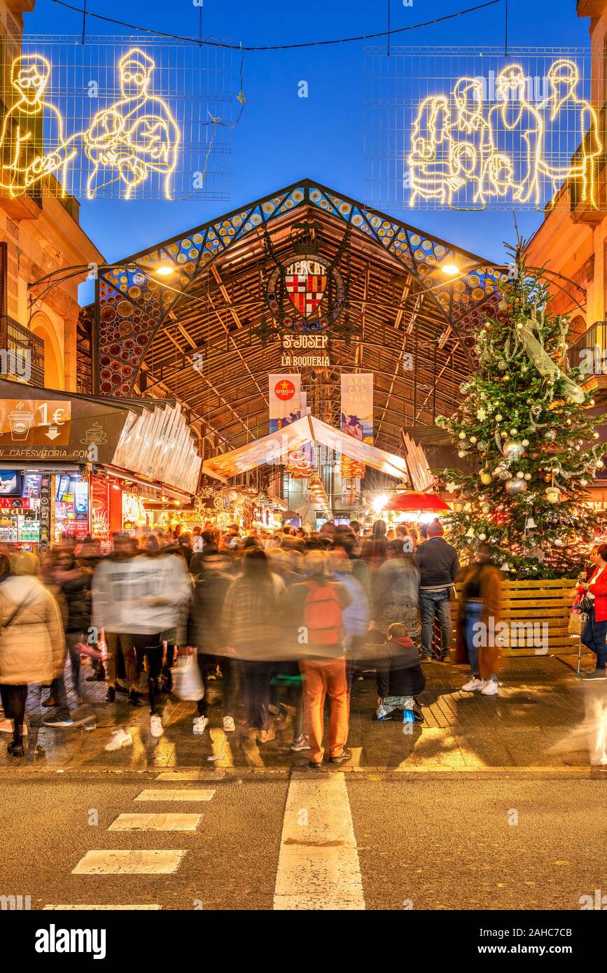 La Boqueria food market entrance adorned with Christmas decorations, Barcelona, Catalonia, Spain Stock Photo