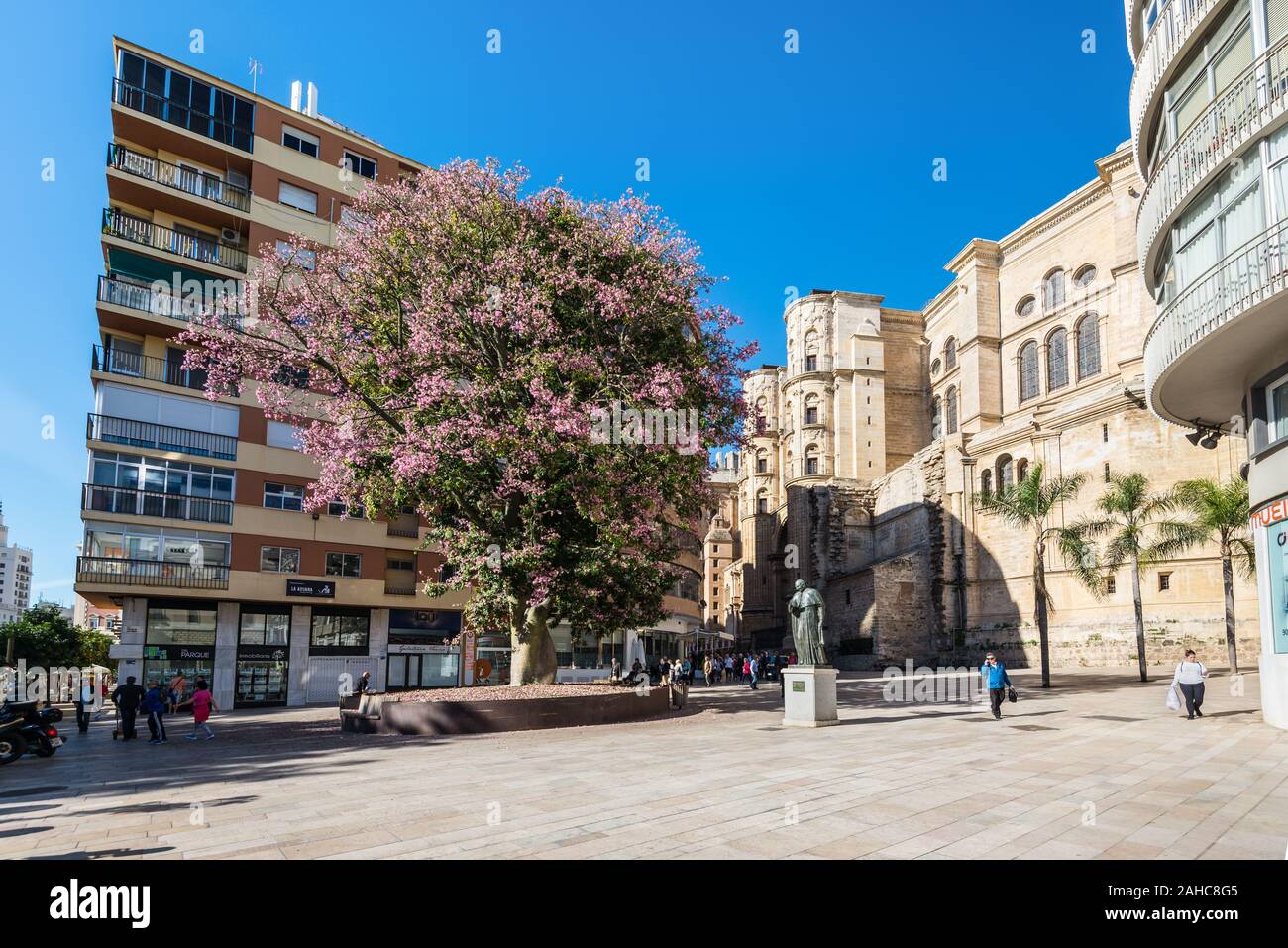 Malaga, Spain - December 4, 2018: Cardenal Herrera Oria Statue on the Cortina del Muelle Street (Calle Cortina del Muelle) near by Cathedral of Malaga Stock Photo