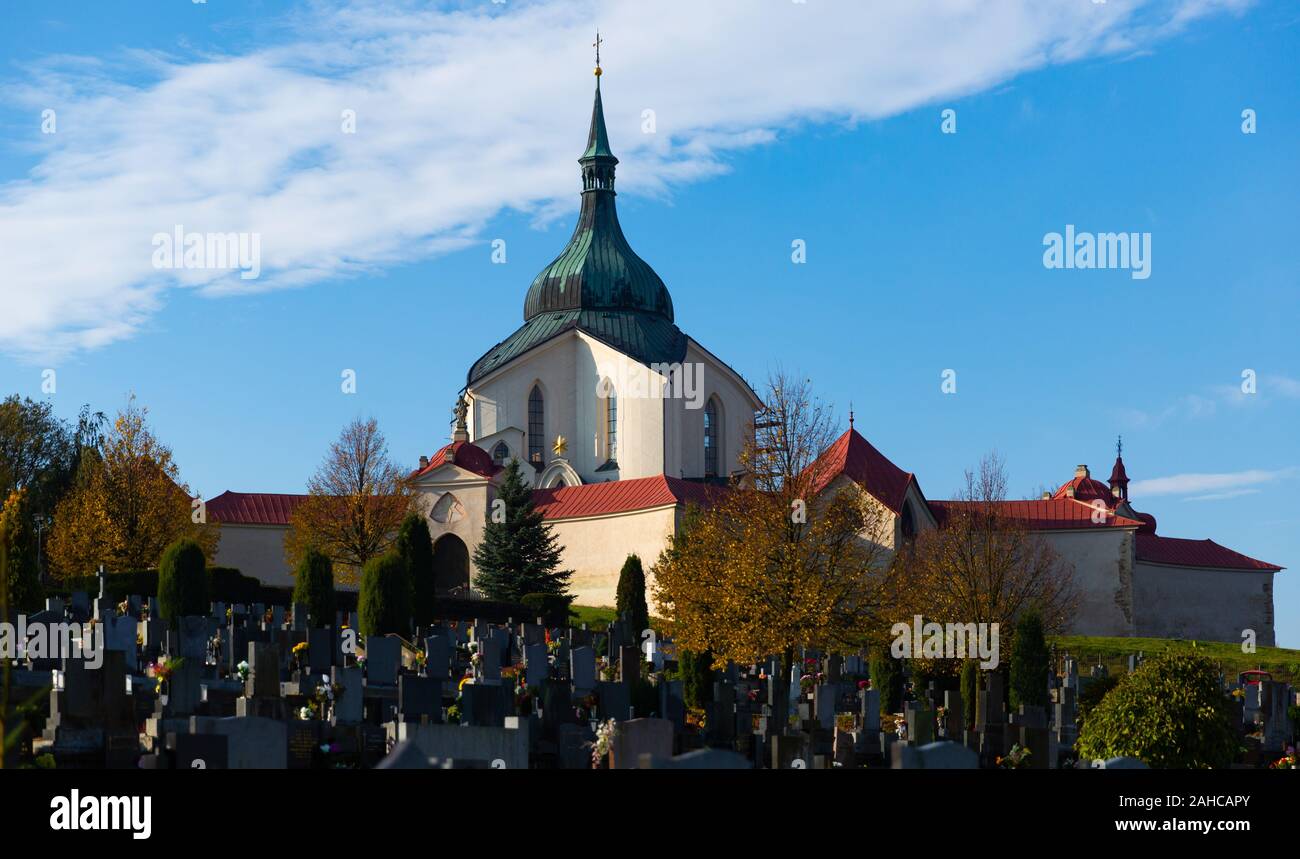 View of Pilgrimage Church of St John of Nepomuk with churchyard at Zelena hora near Czech town of Zdar nad Sazavou on sunny autumn day Stock Photo