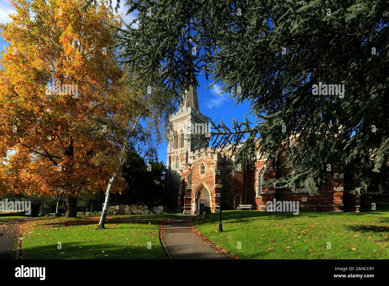 Autumn colours over St Marys church, Finedon village, Northamptonshire